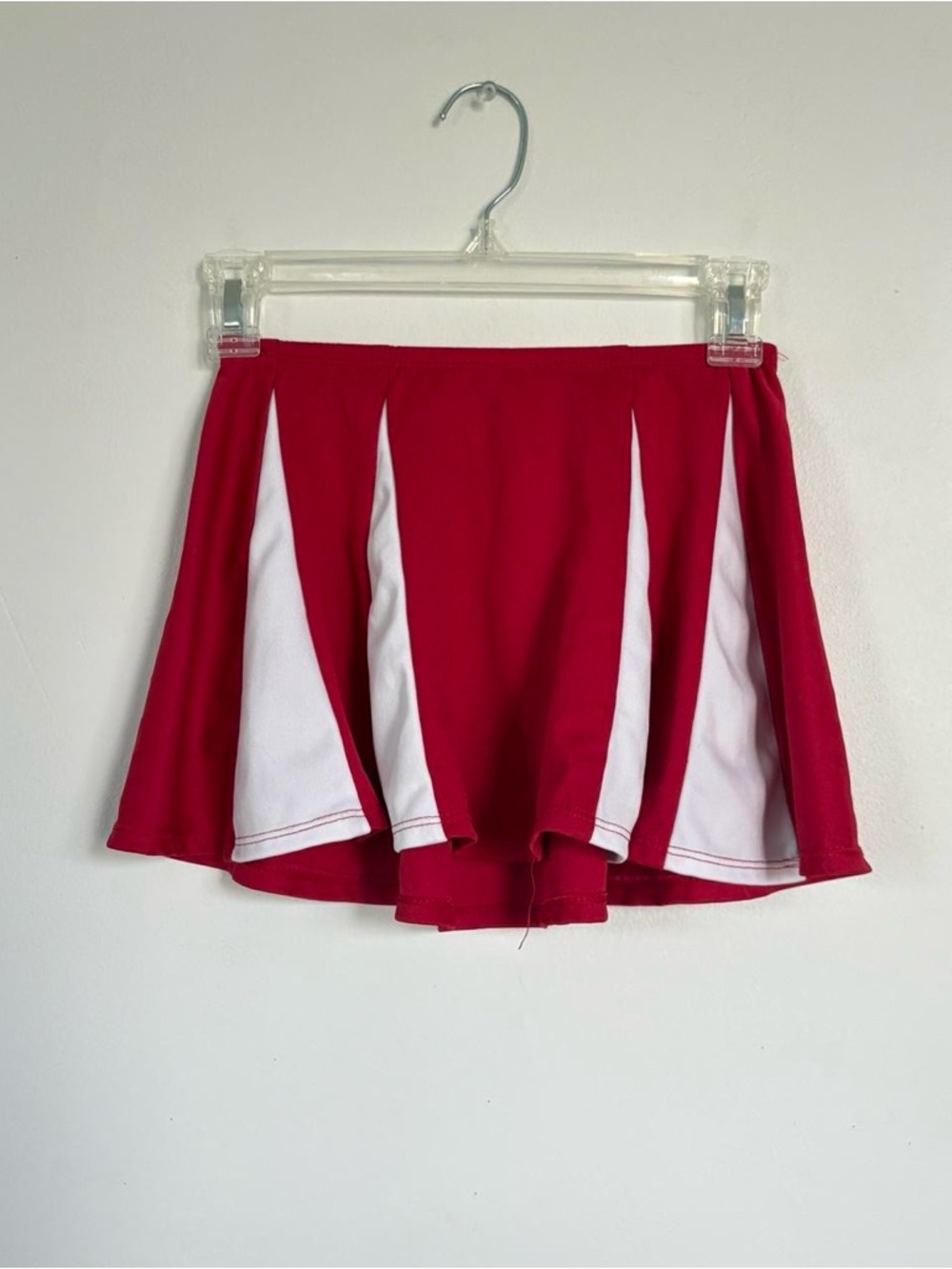 Red and white cheer skirt.